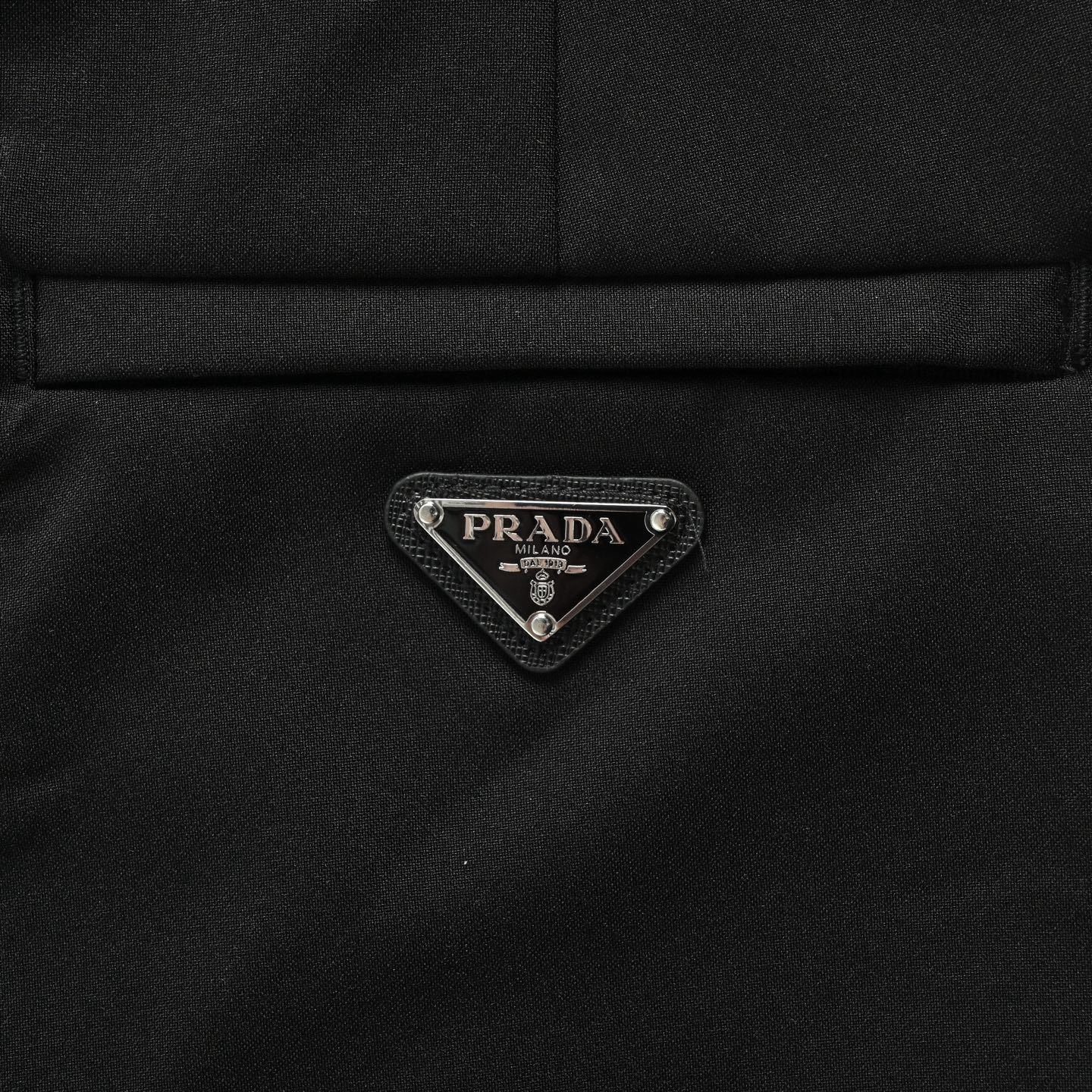 Prada 25ss stretch trousers with triangle logo on back pockets