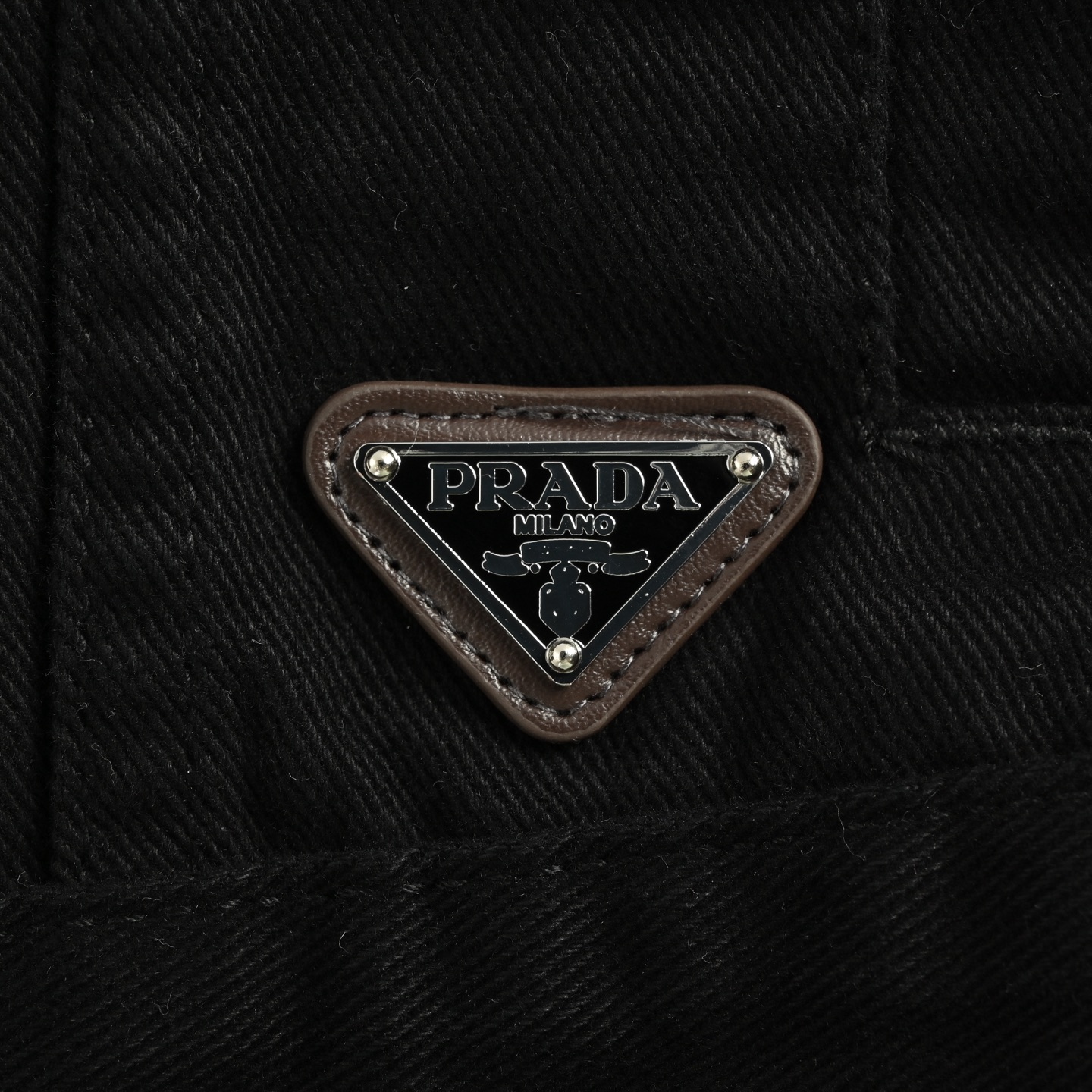 Prada 25ss denim jacket with triangle logo on the hem