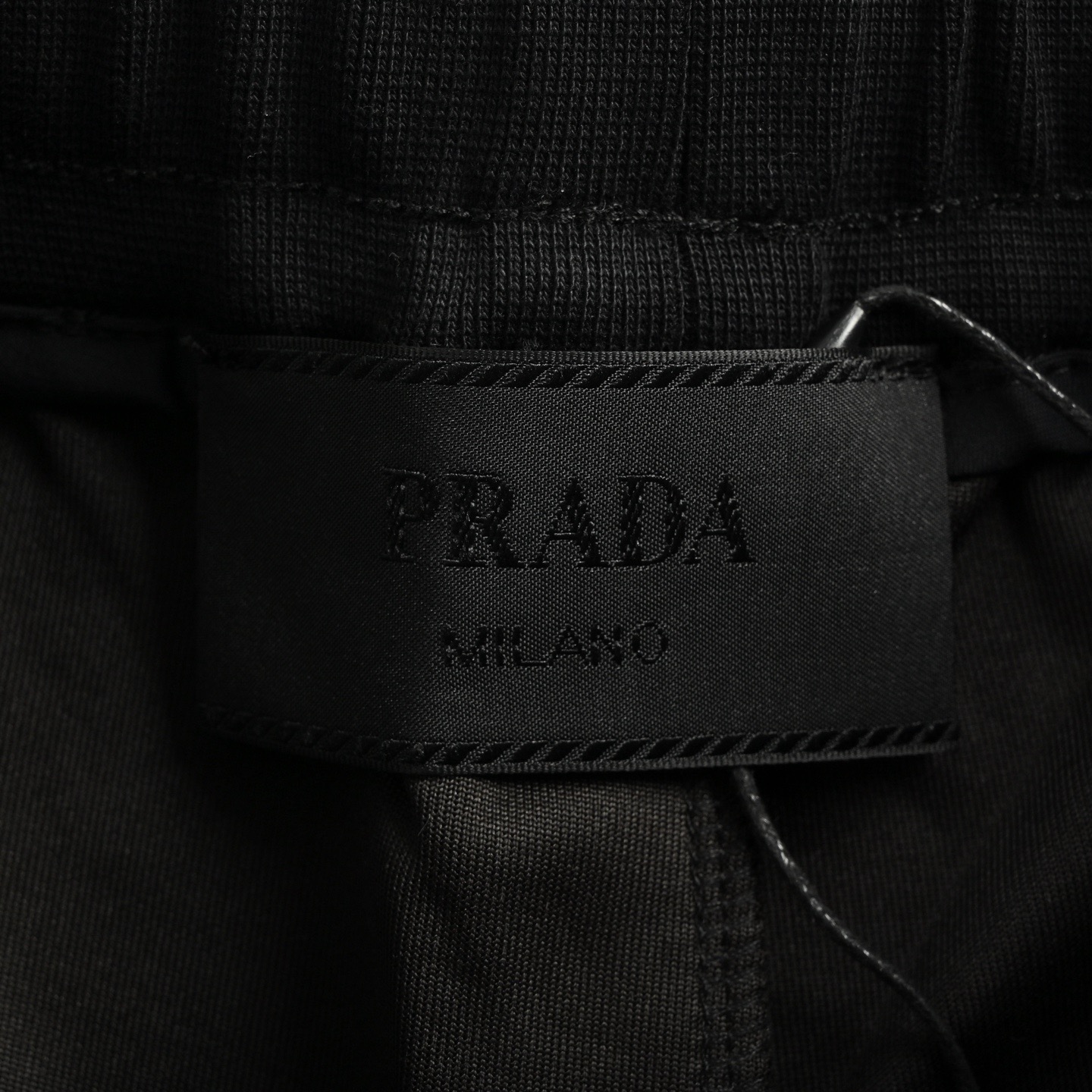 Prada 25ss triangle hem nylon patchwork pocket shorts