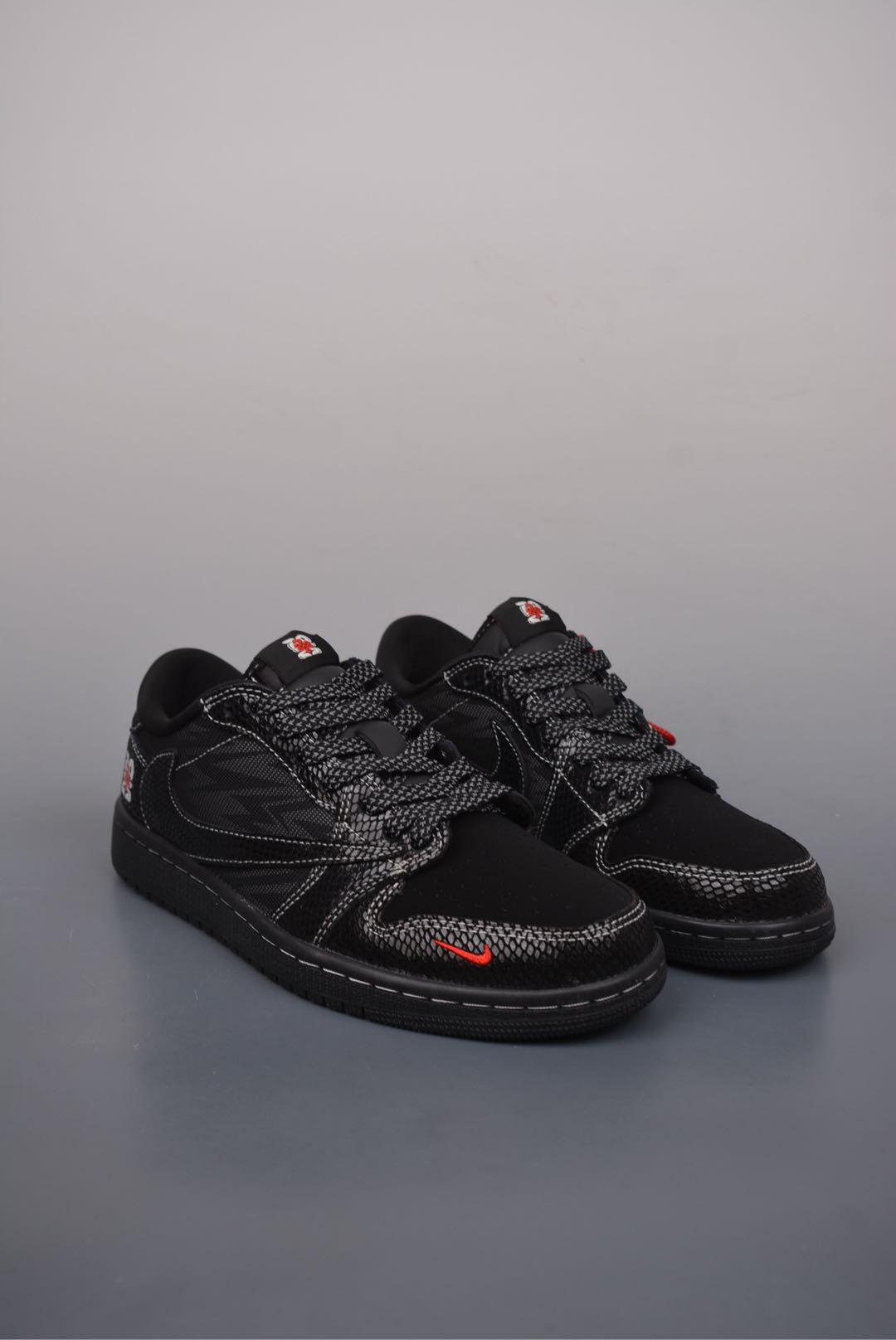 Travis Scott x Nike Air Jordan 1 Low Year of the Snake black and red CH6336-018