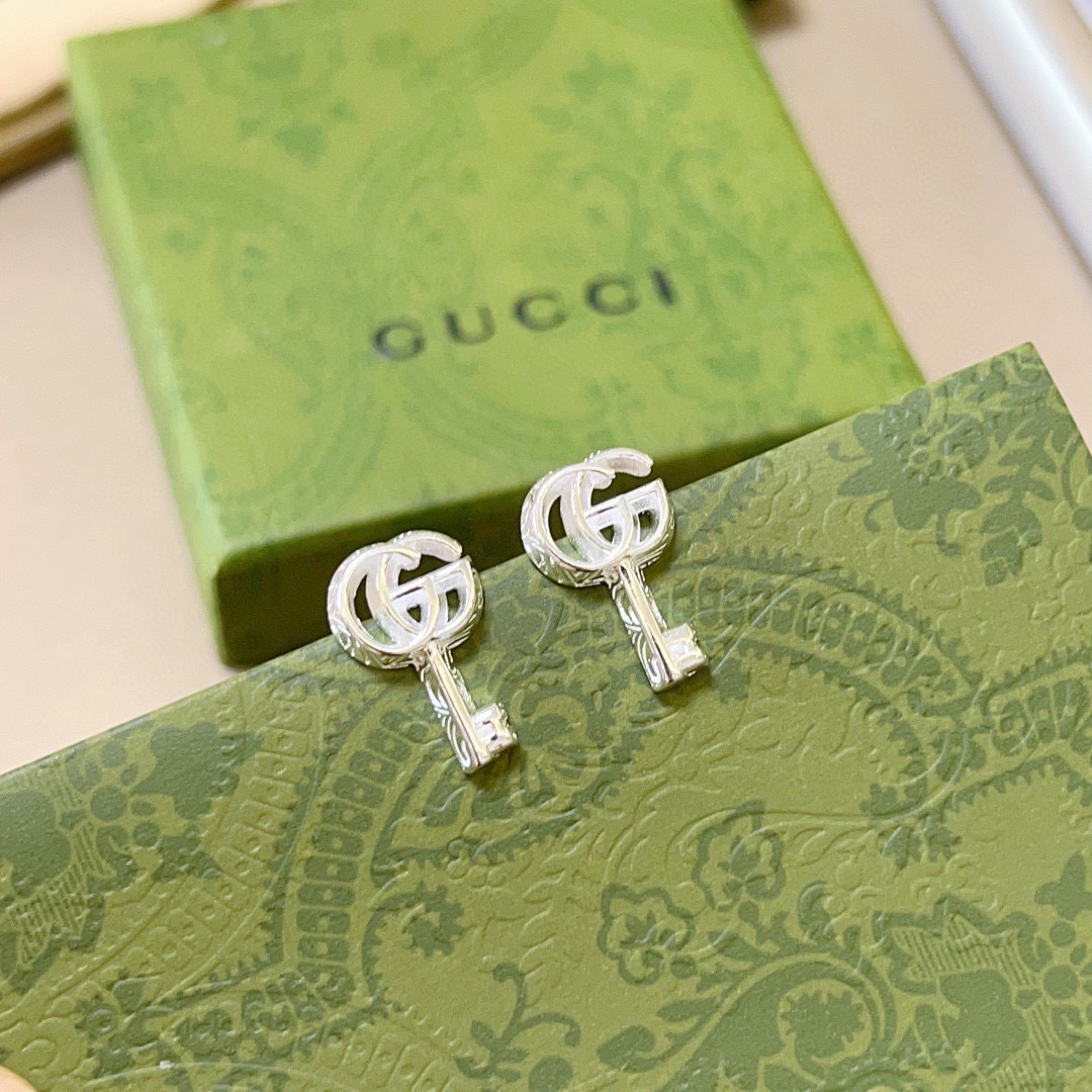 GUCCi key earrings