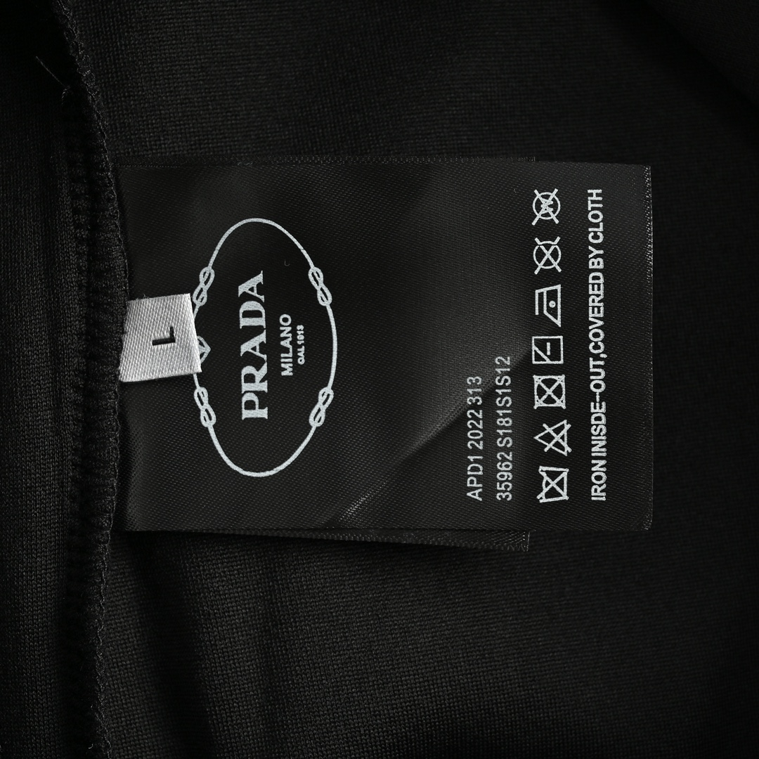 Prada embroidered logo trousers