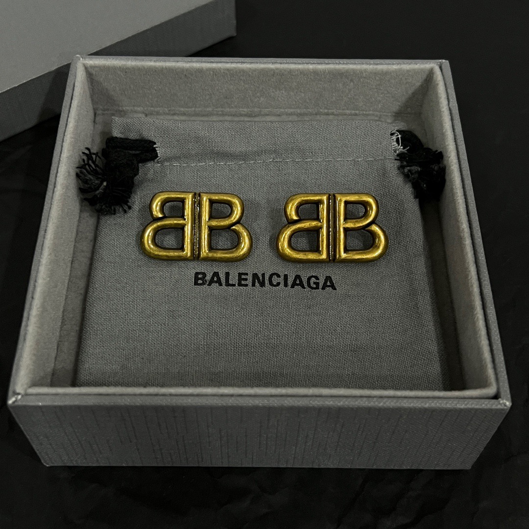Balenciaga BB distressed earrings