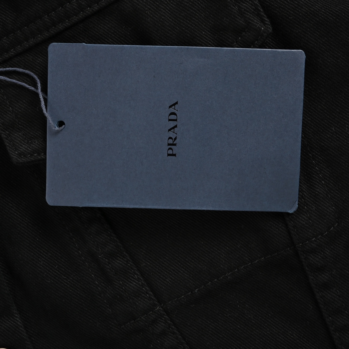 Prada 25ss denim jacket with triangle logo on the hem
