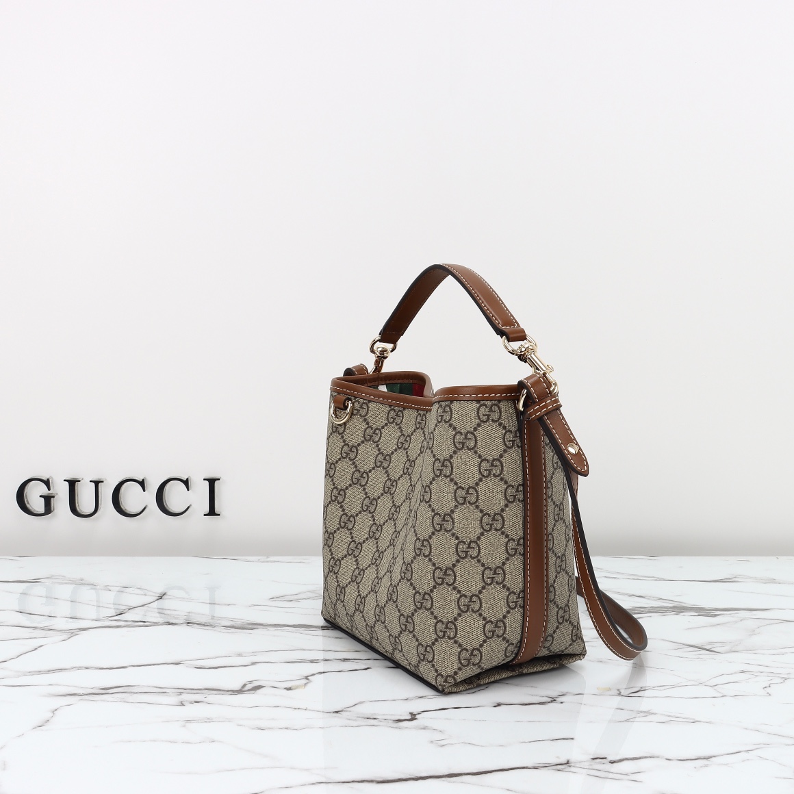 Gucci GG Emblem small bucket bag ‎815118 FAD6L 9758