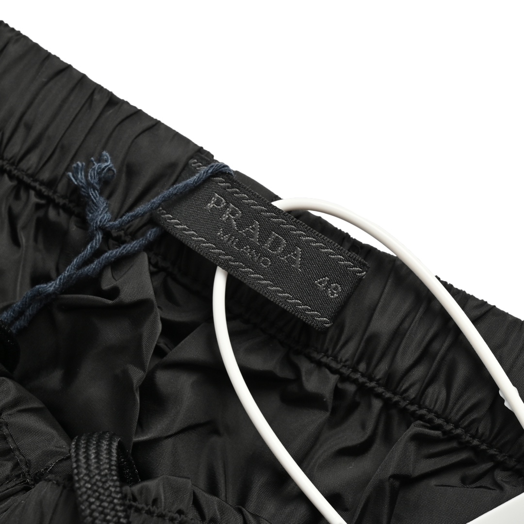 Prada 23ss Re-Nylon Metal Triangle Logo Functional Laminating Pants