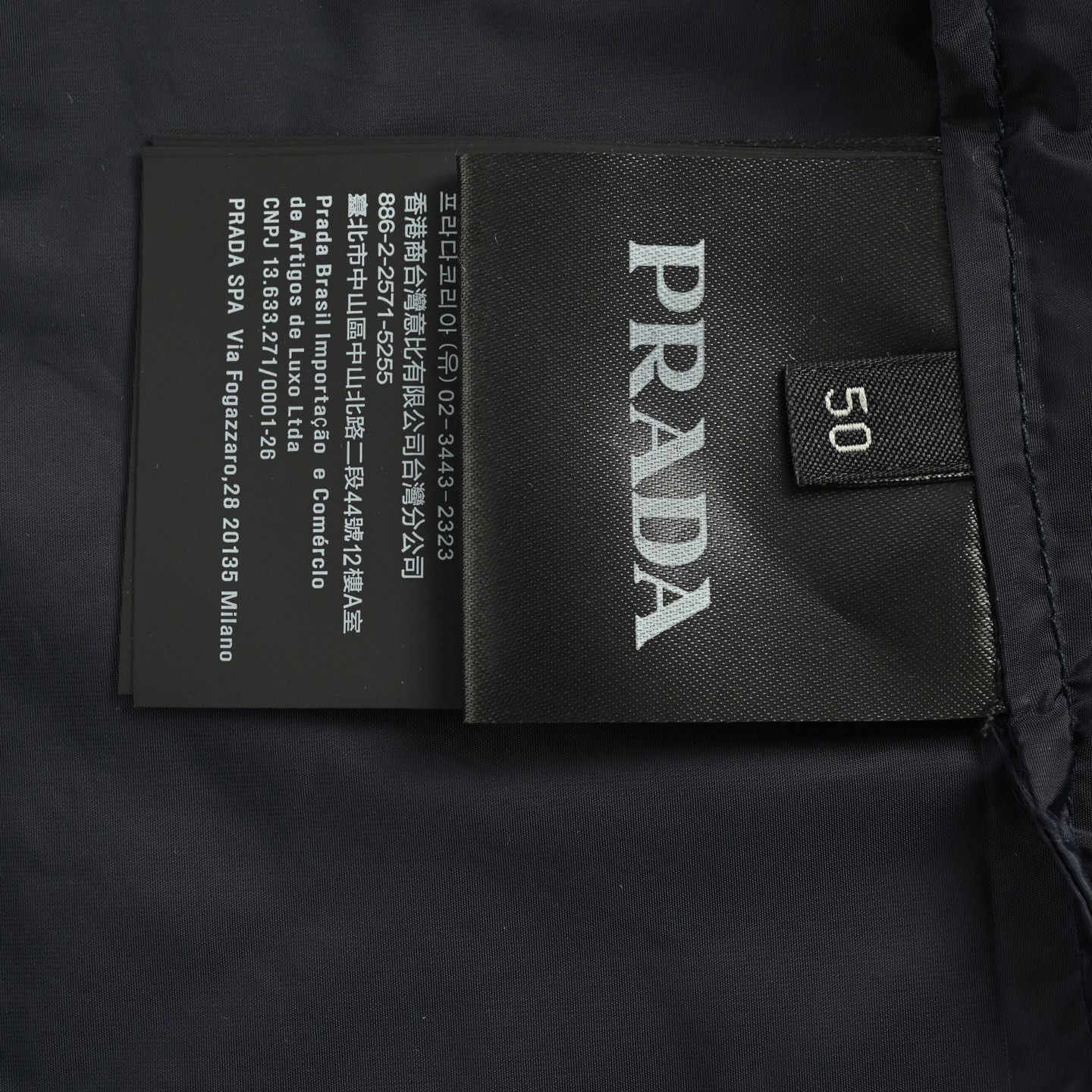 Prada 25Fw triangle logo contrast zip recycled nylon hooded jacket