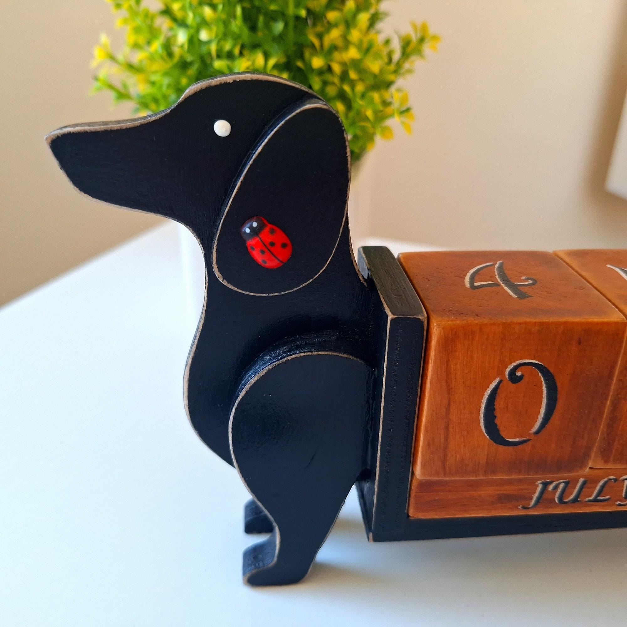 ON SALE 🔥 Perpetual Calendar Dachshund Figurine