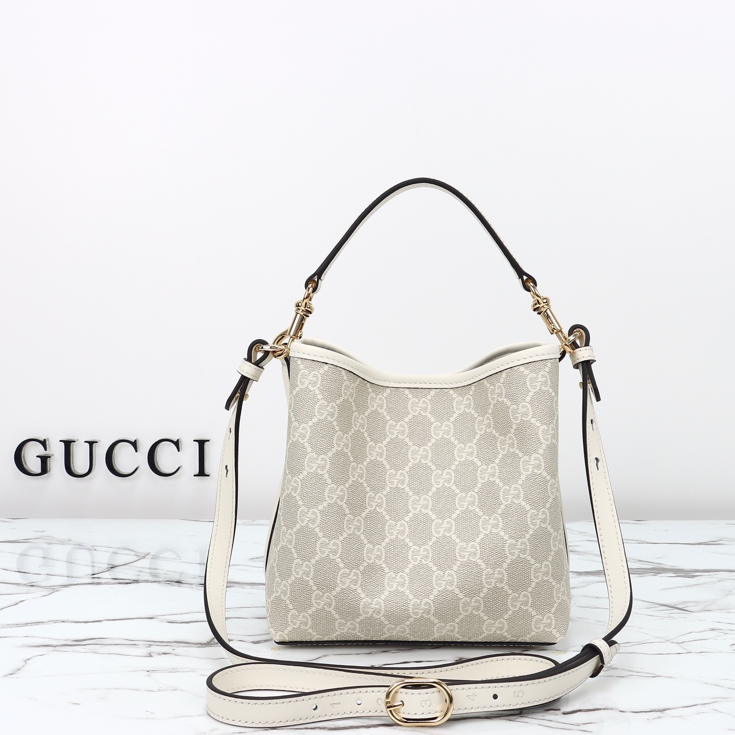 Gucci GG Emblem small bucket bag ‎815118 FAD6L 9641