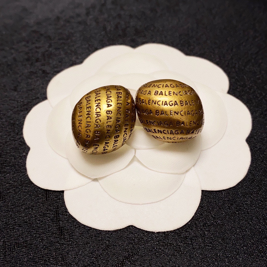 Balenciaga antique gold engraved letter earrings