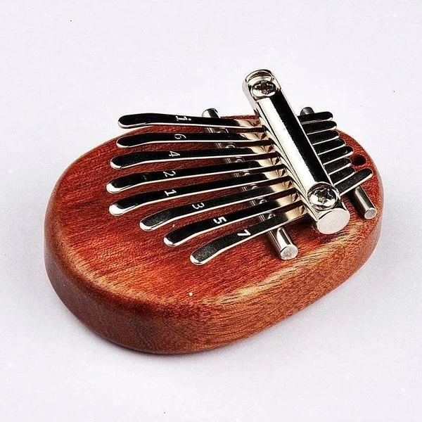 (🔥HOT SALE NOW - SAVE 50% OFF)  8 Keys Mini Kalimba Thumb Piano -BUY 3 FREE SHIPPING