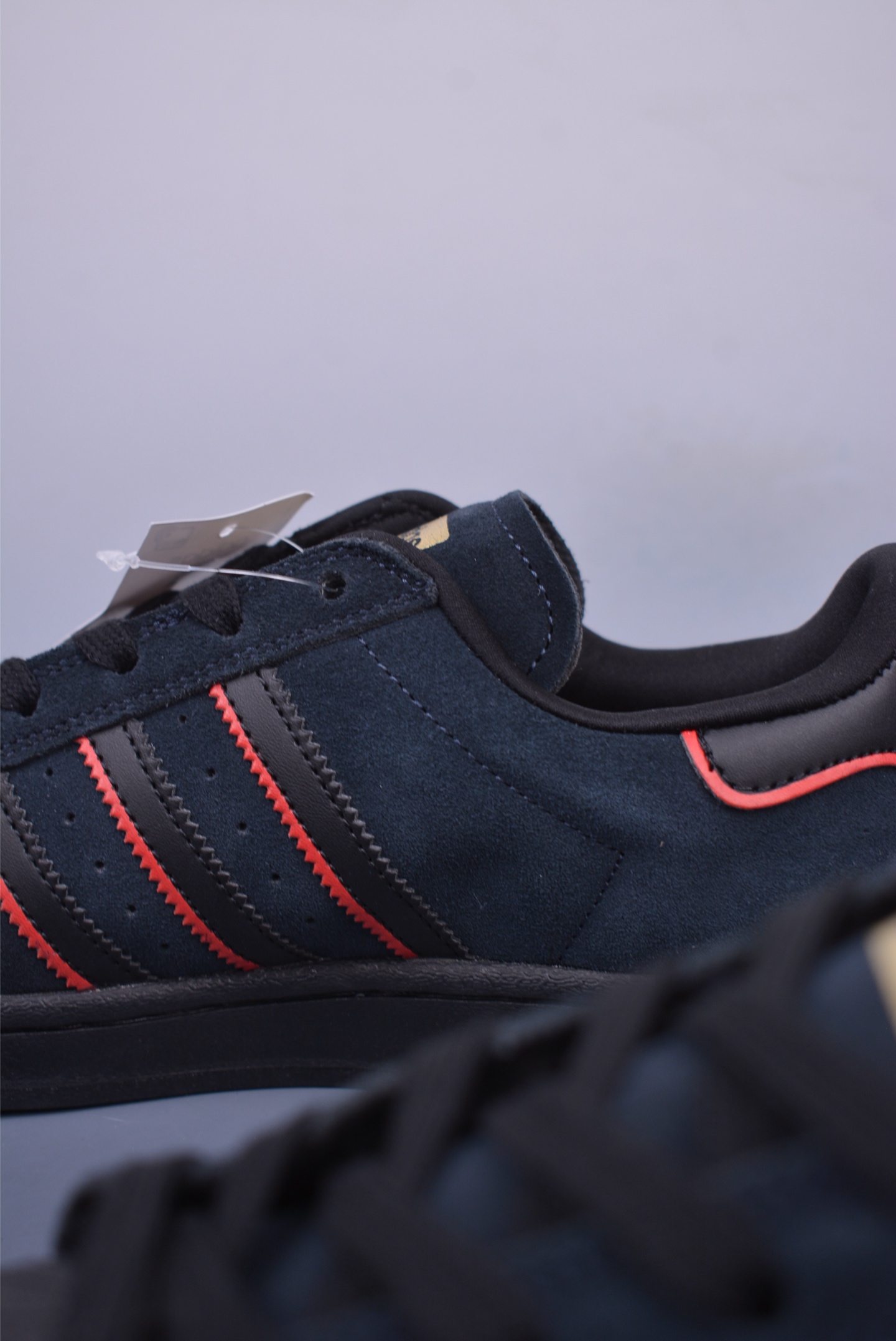 Felipe Gustavo x Adidas Superstar ADV sports shoes black, red and gold JR7831