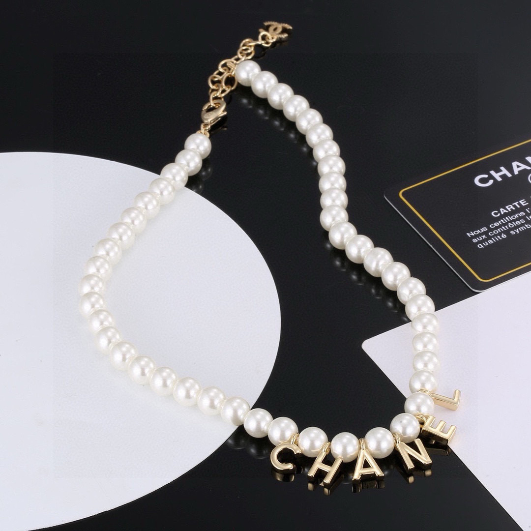 Chanel alphabet pearl necklace