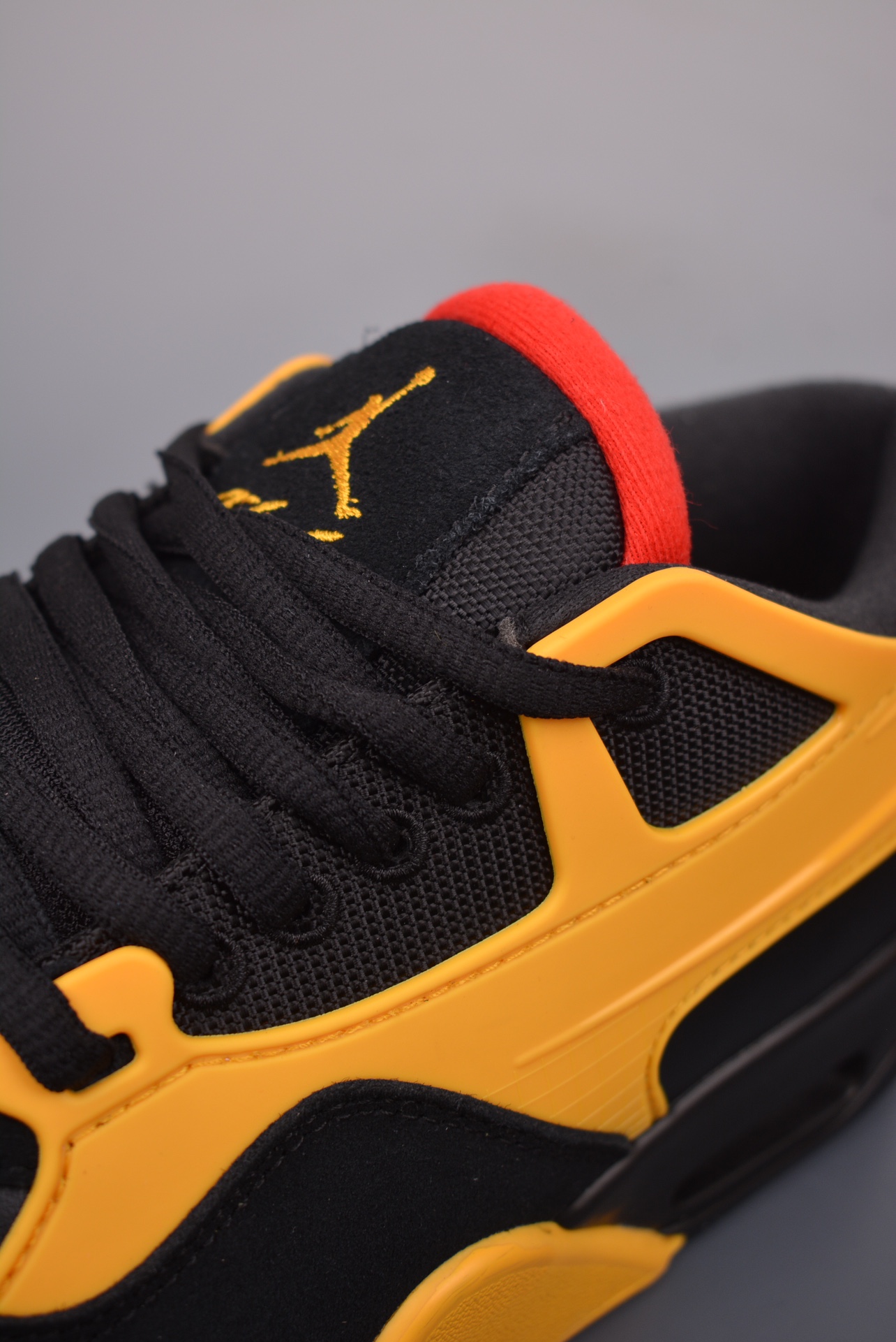 Nigel Sylvester x Jordan Air Jordan 4 RM AJ4 black and yellow FQ7939-007
