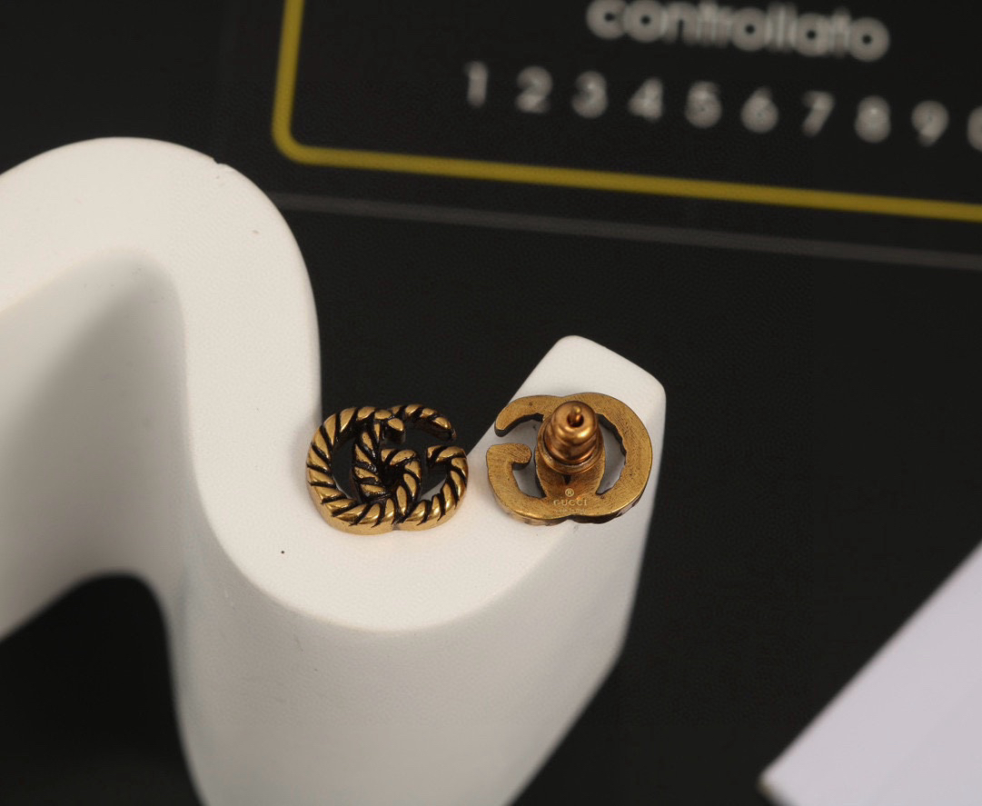 GUCCi GG distressed earrings