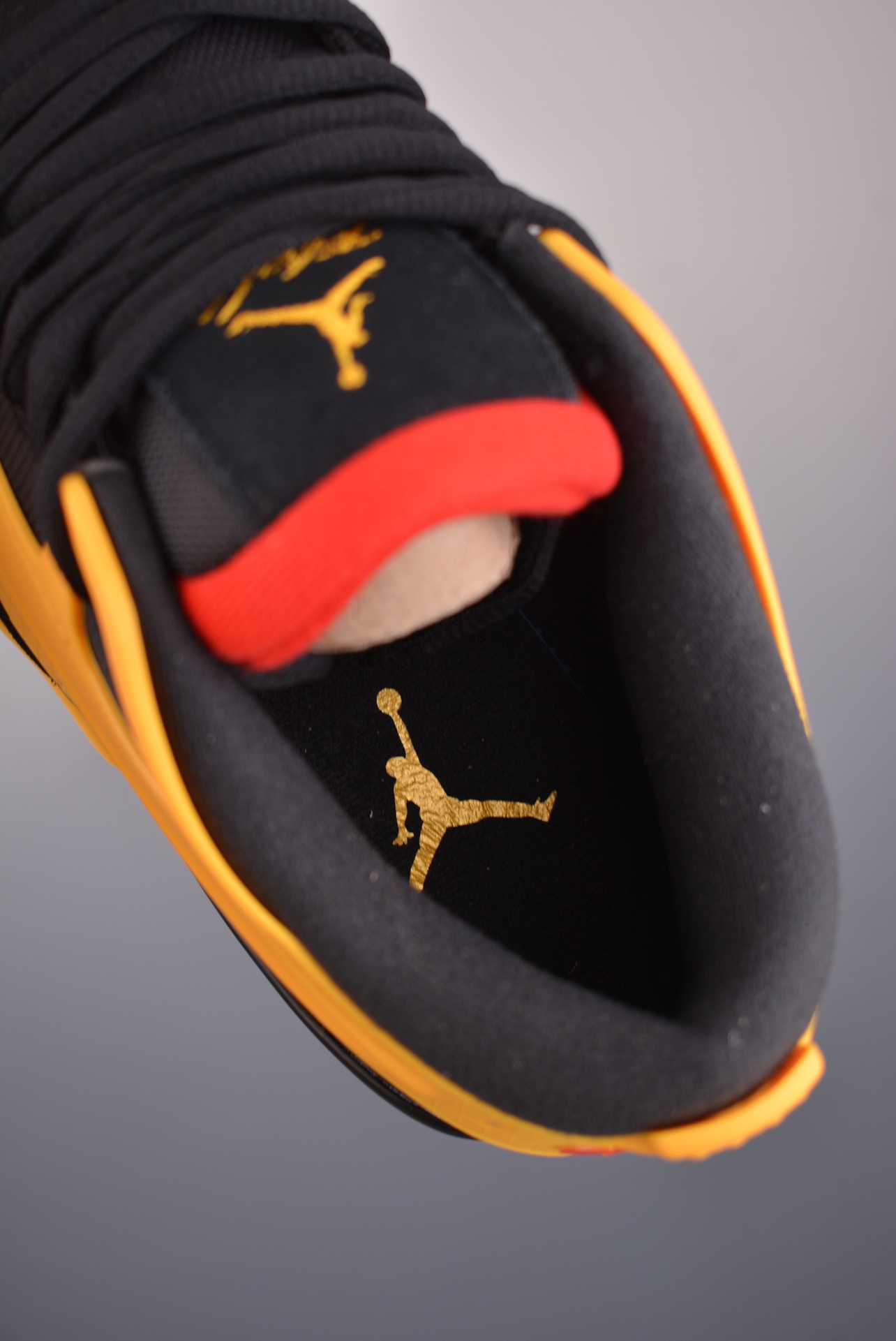 Nigel Sylvester x Jordan Air Jordan 4 RM AJ4 black and yellow FQ7939-007