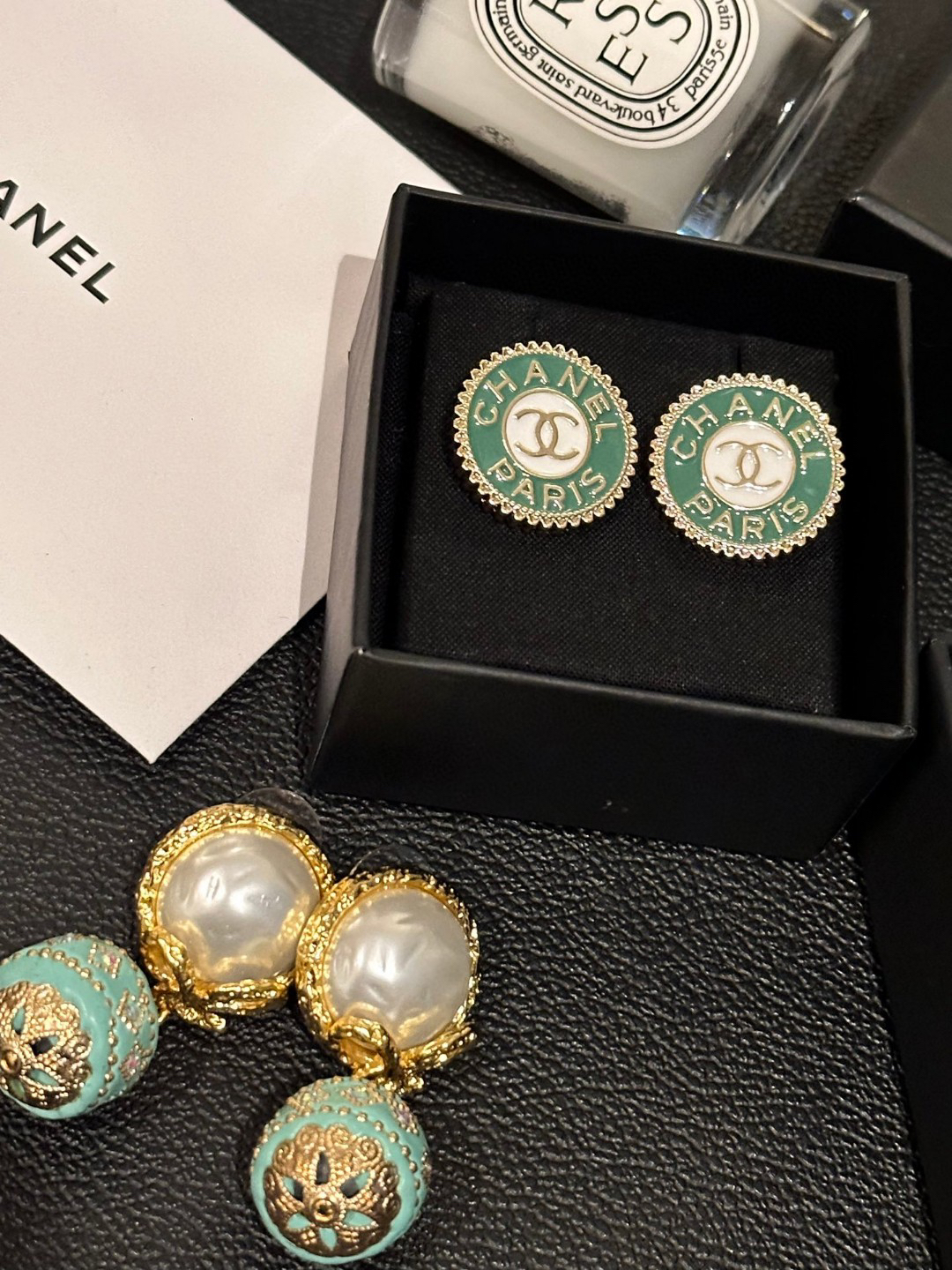 Chanel two-tone badge earrings