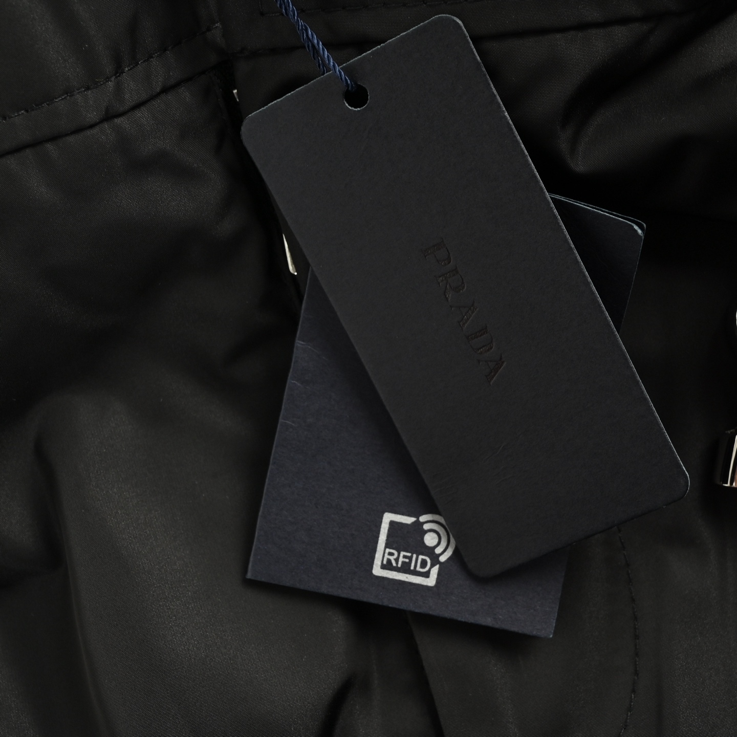 Prada 25ss triangle logo zip pocket nylon shorts