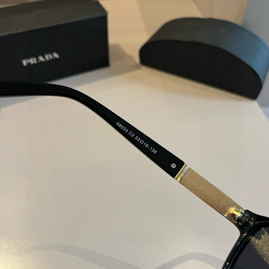 Prada round frame sunglasses