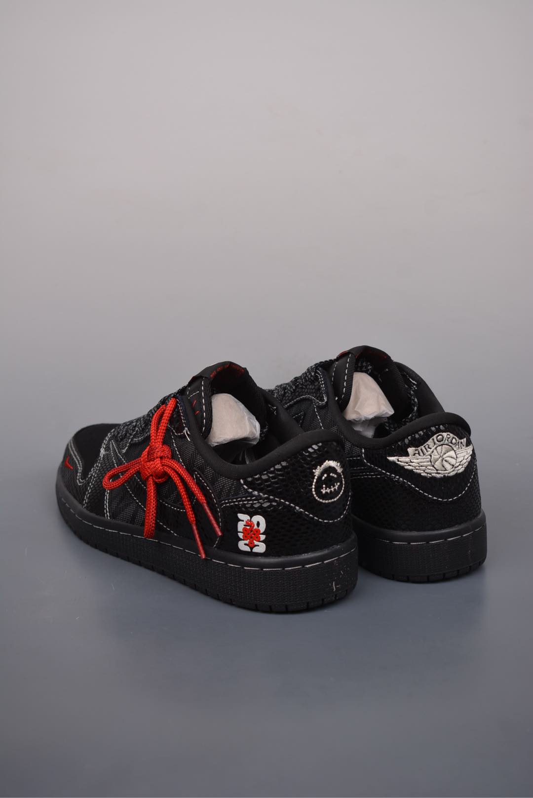 Travis Scott x Nike Air Jordan 1 Low Year of the Snake black and red CH6336-018
