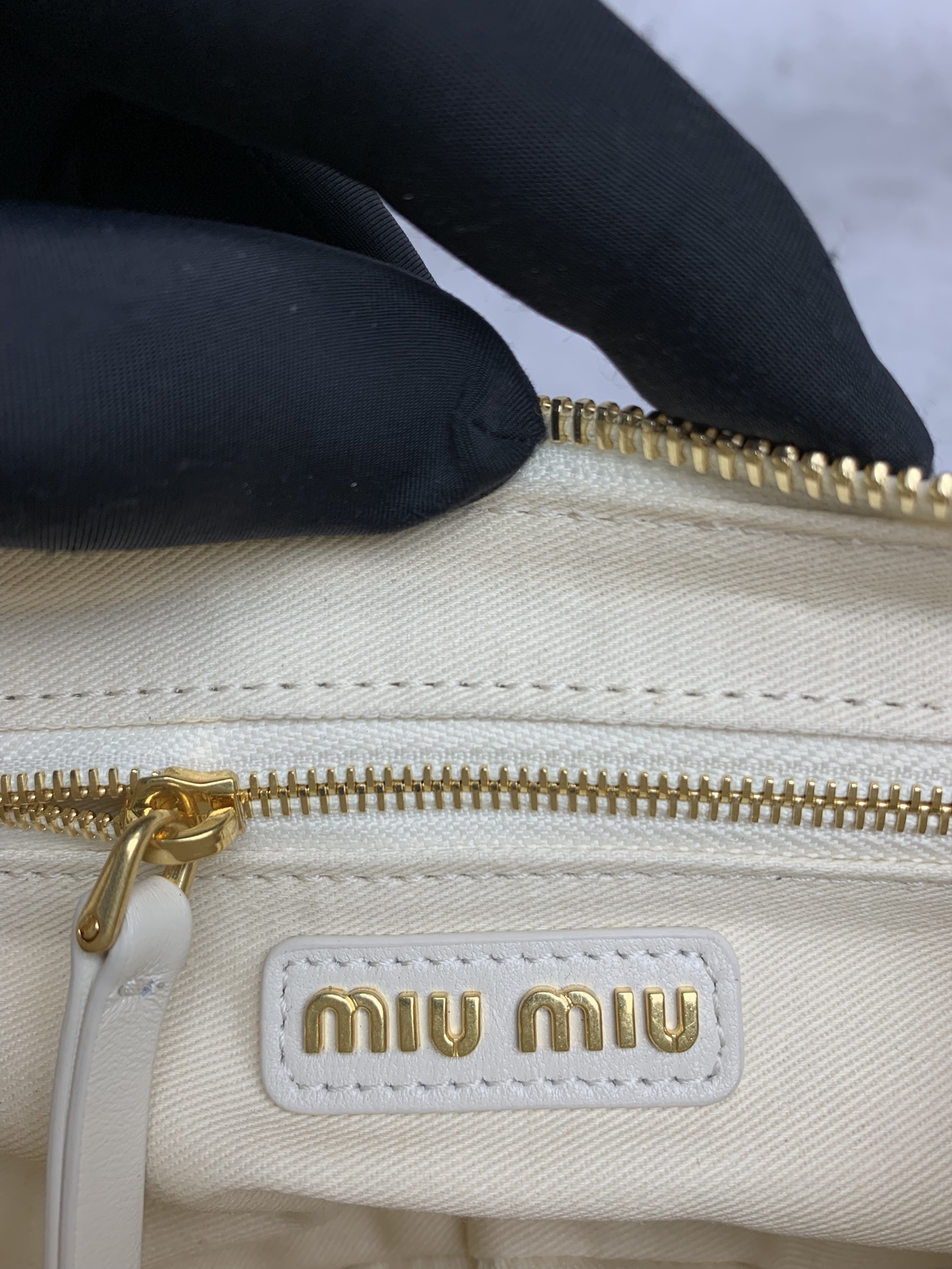 Miu Miu Multi-Pocket Biker Bag