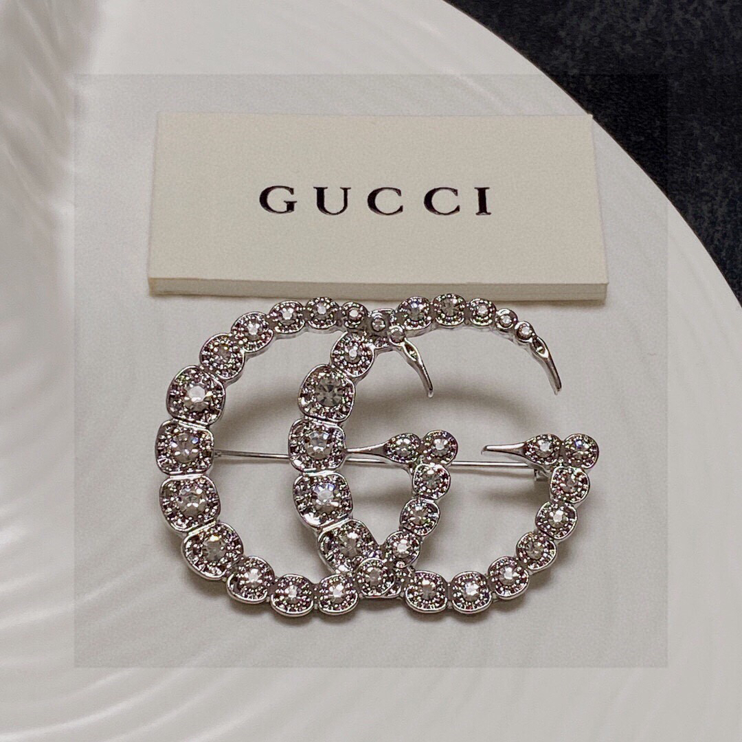 Gucci GG diamond brooch