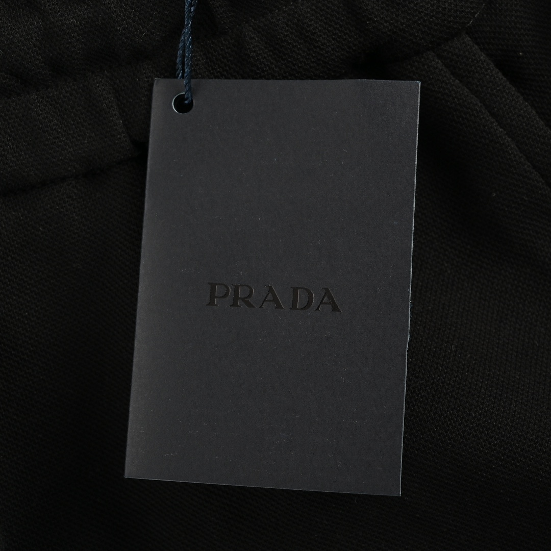 Prada 24Fw knee pocket metal triangle logo cuff trousers