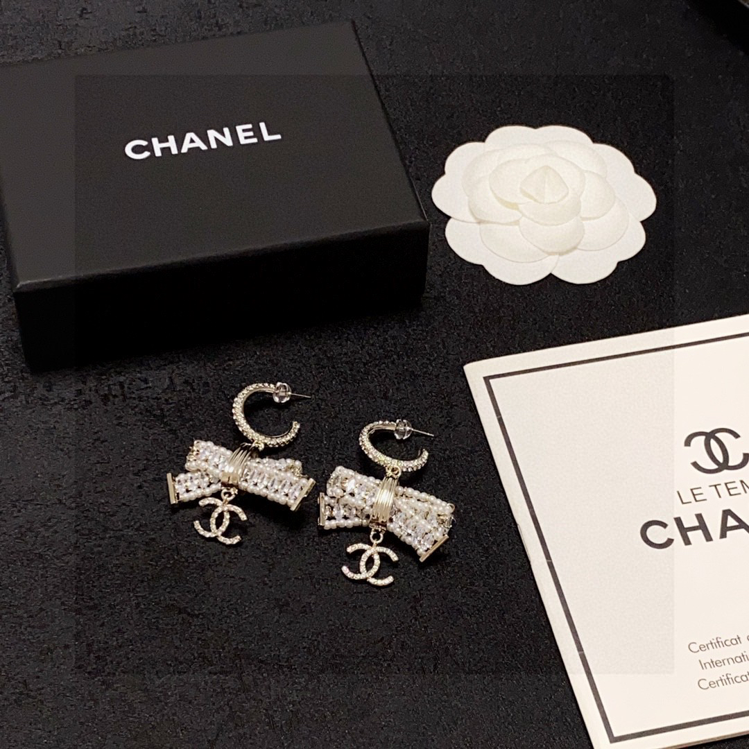 Chanel full diamond pearl bow earrings