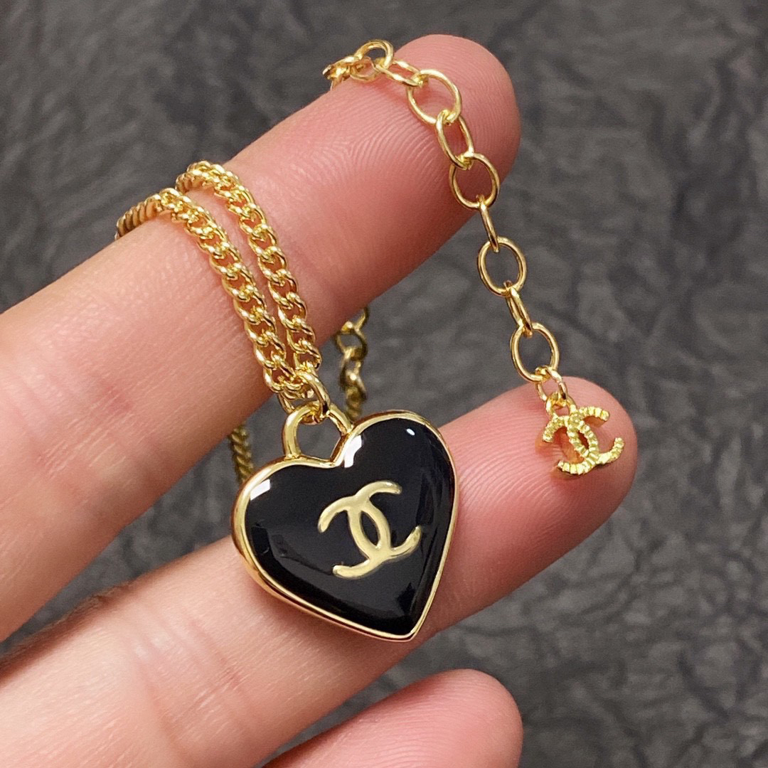Chanel black heart double-sided necklace