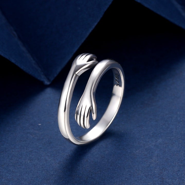 ADJUSTABLE HUG RING