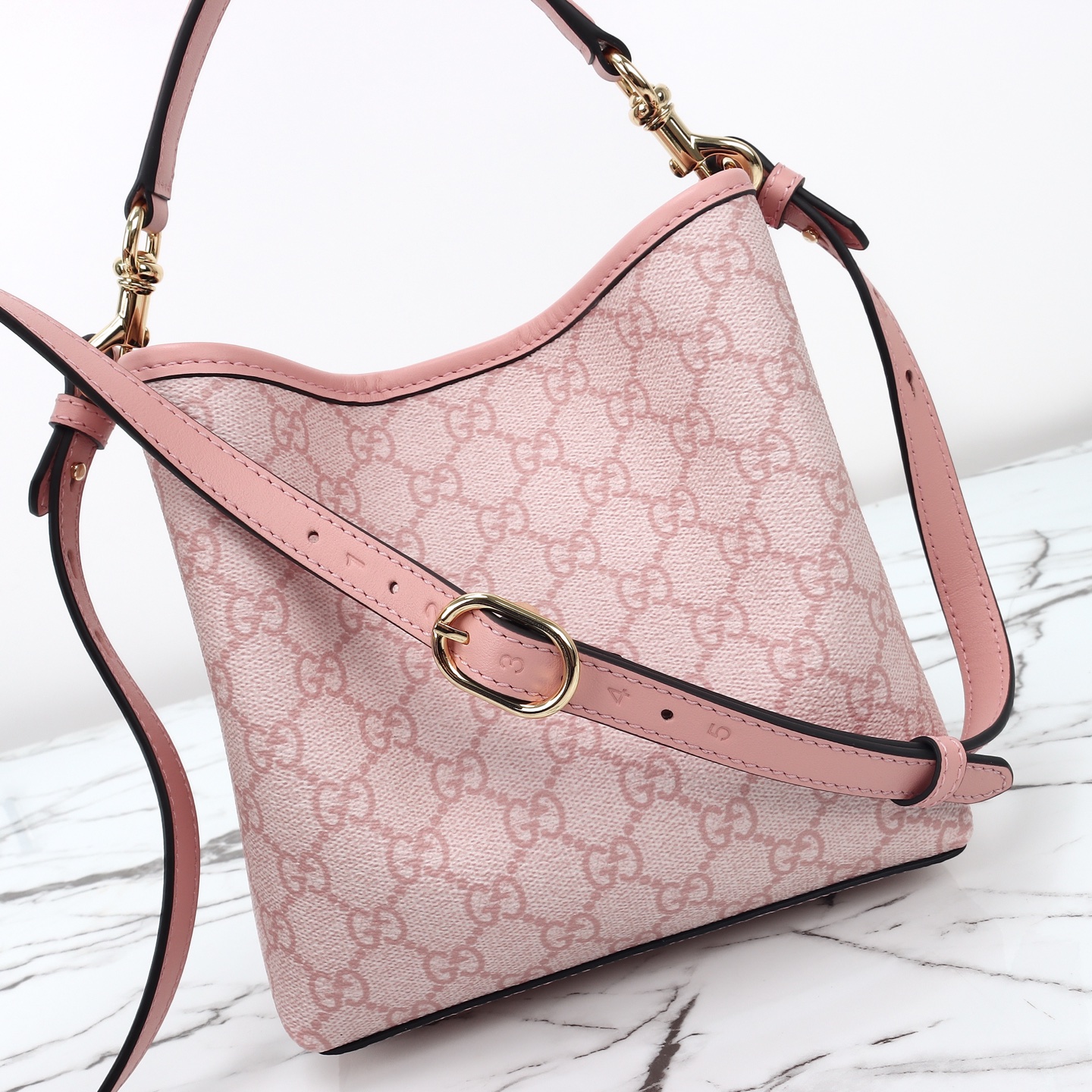 Gucci GG Emblem small bucket bag ‎815118 FAD6L 8459