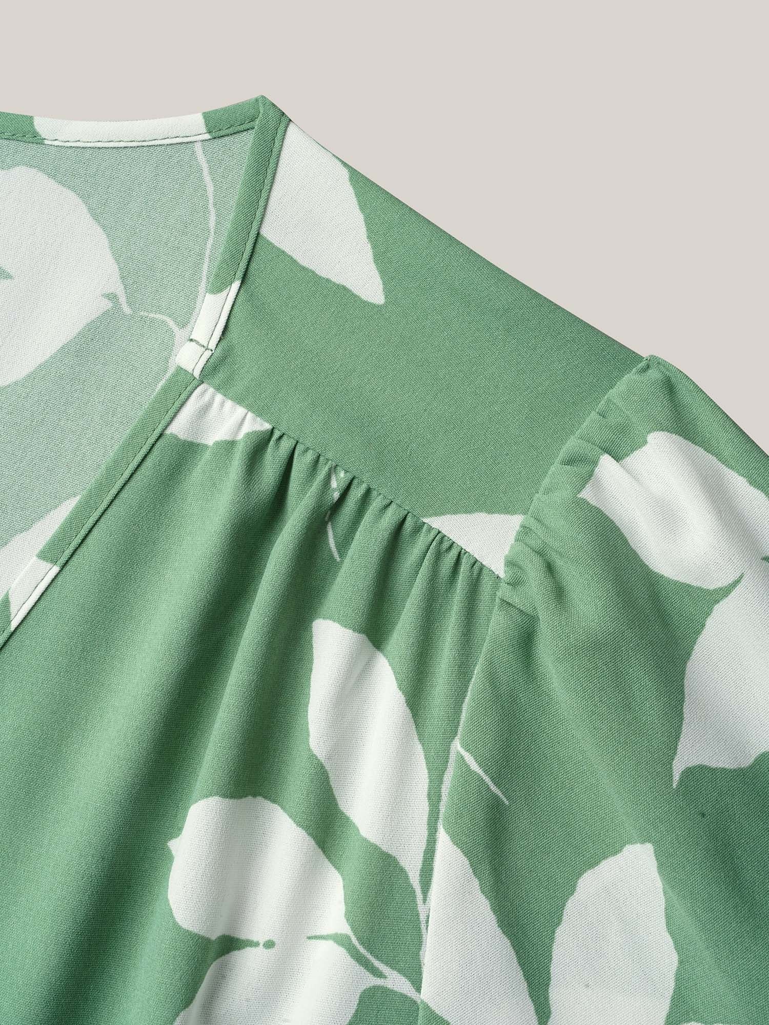 Leaf Print Waist-Cinched Flared Maxi Dress