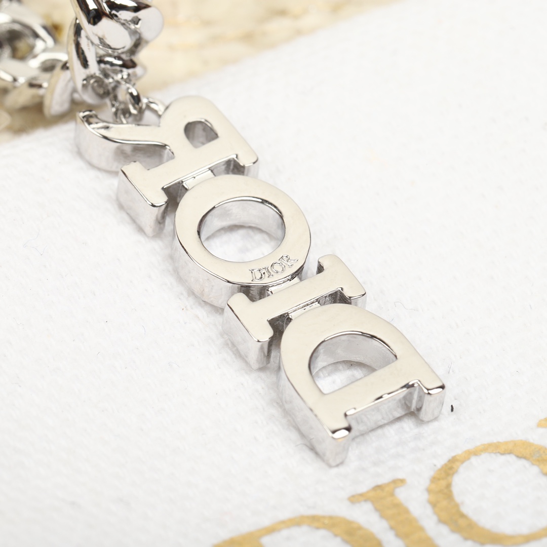 Dior chain diamond font earrings