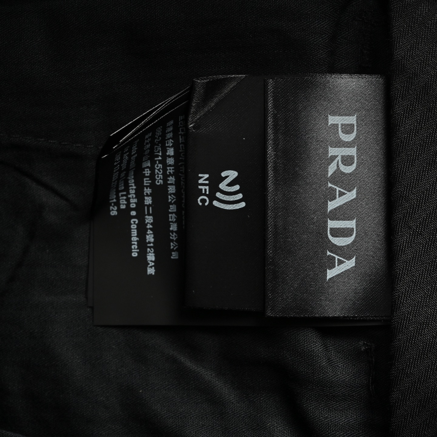 Prada 25ss back pocket triangle logo stretch trousers