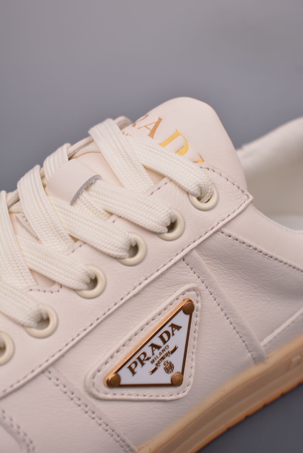 Prada Downtown Low Sneakers off-white