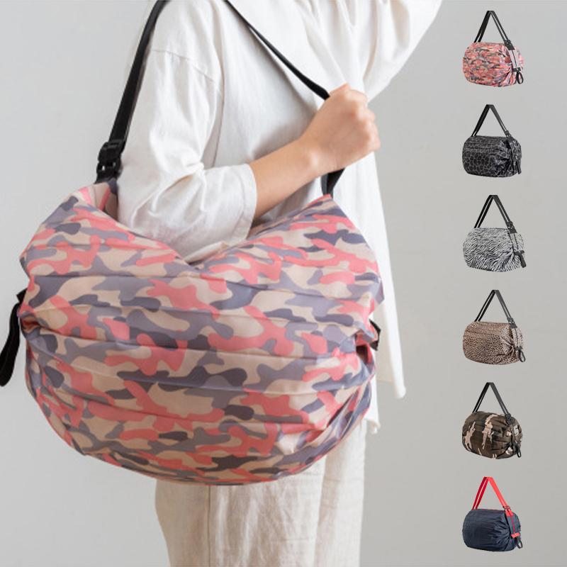 (🔥Last Day Promotion-SAVE 50% OFF) --Foldable Travel Portable Shopping Bag(Random Color Giveaway)-BUY 3 GET 2 FREE & FREE SHIPPING