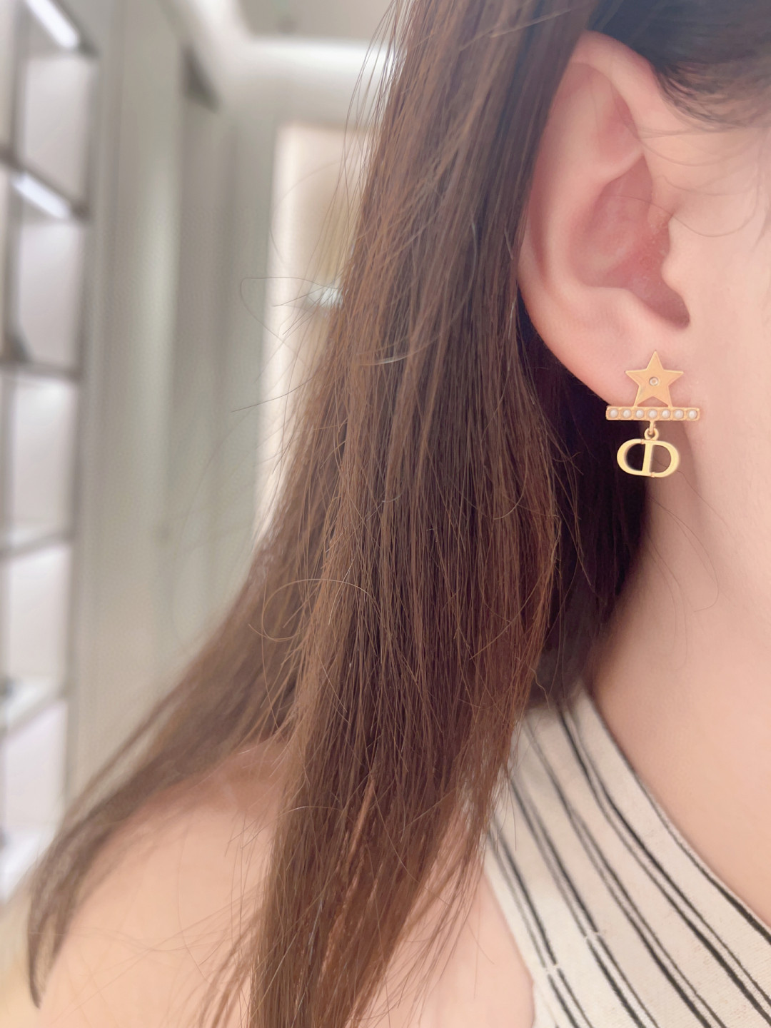 Dior star horizontal bead cd earrings
