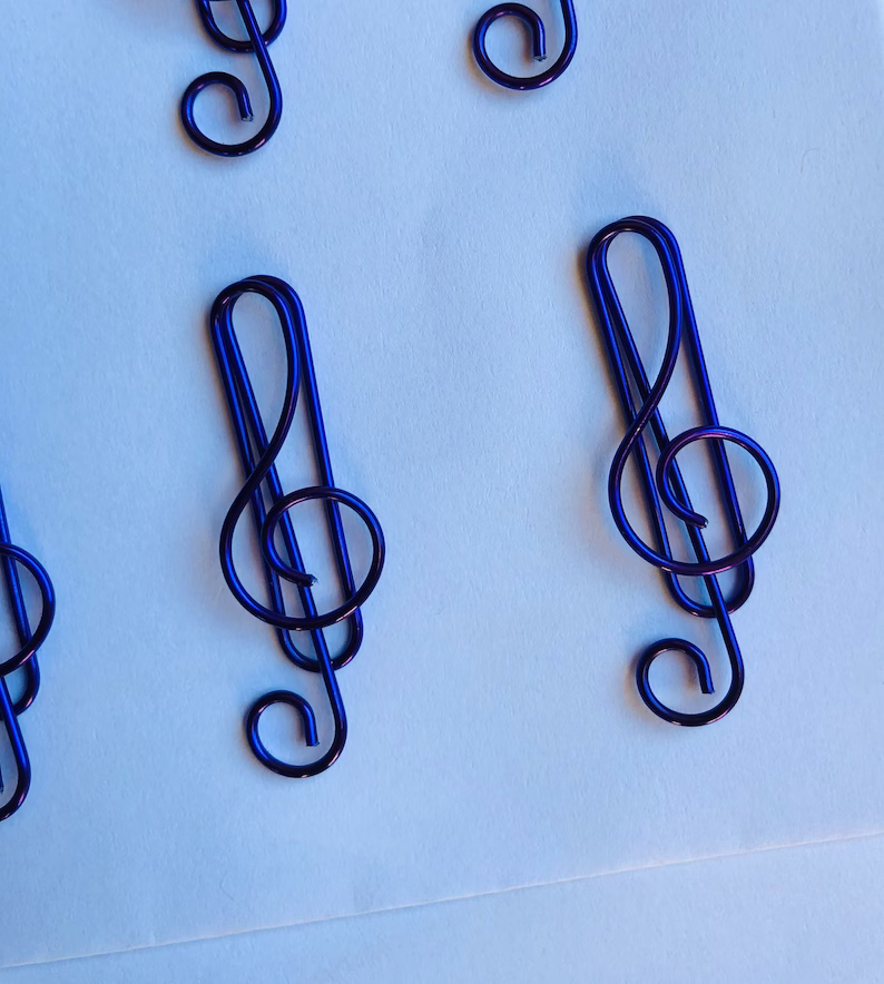 A set of 10 high quality music treble clef colored metal paper clips