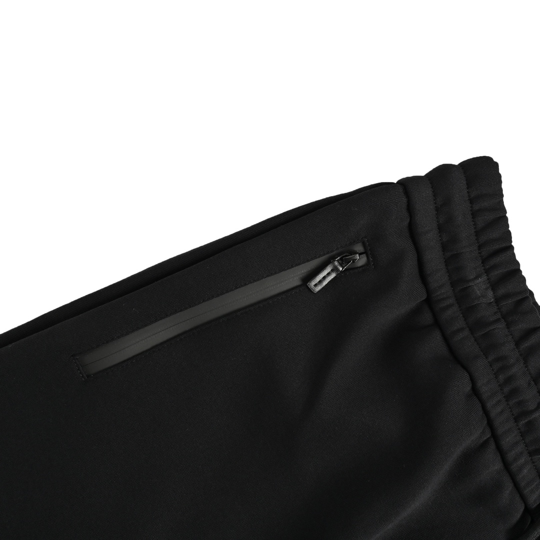 Prada embroidered logo trousers