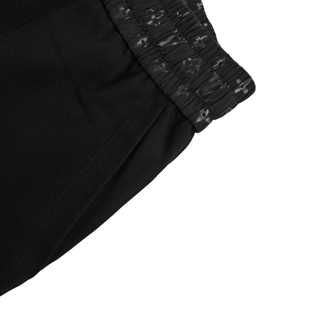 Louis Vuitton catwalk trousers with embroidered logo