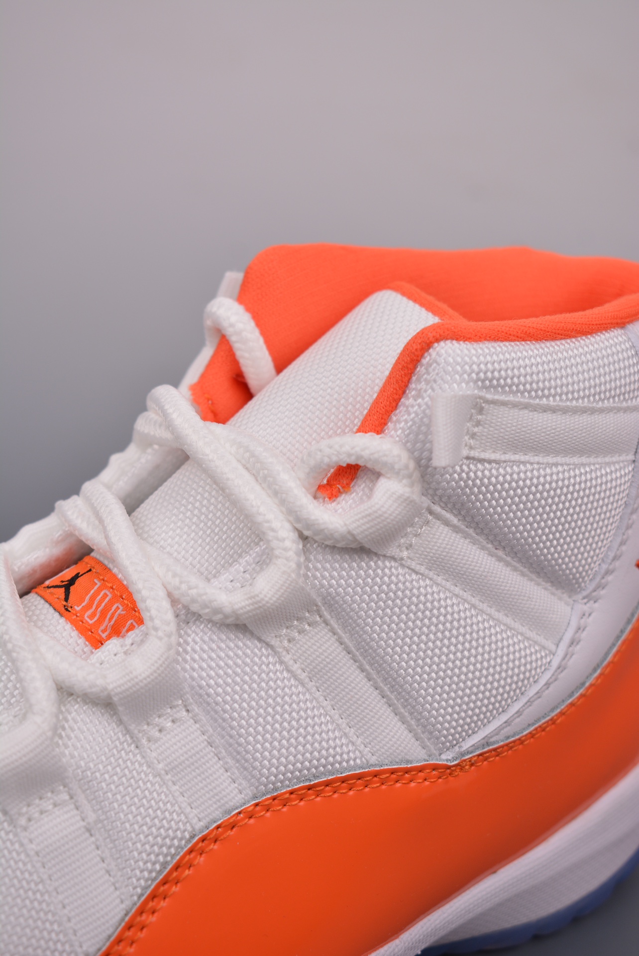 Air Jordan 11 Retro White and Orange 378037-002