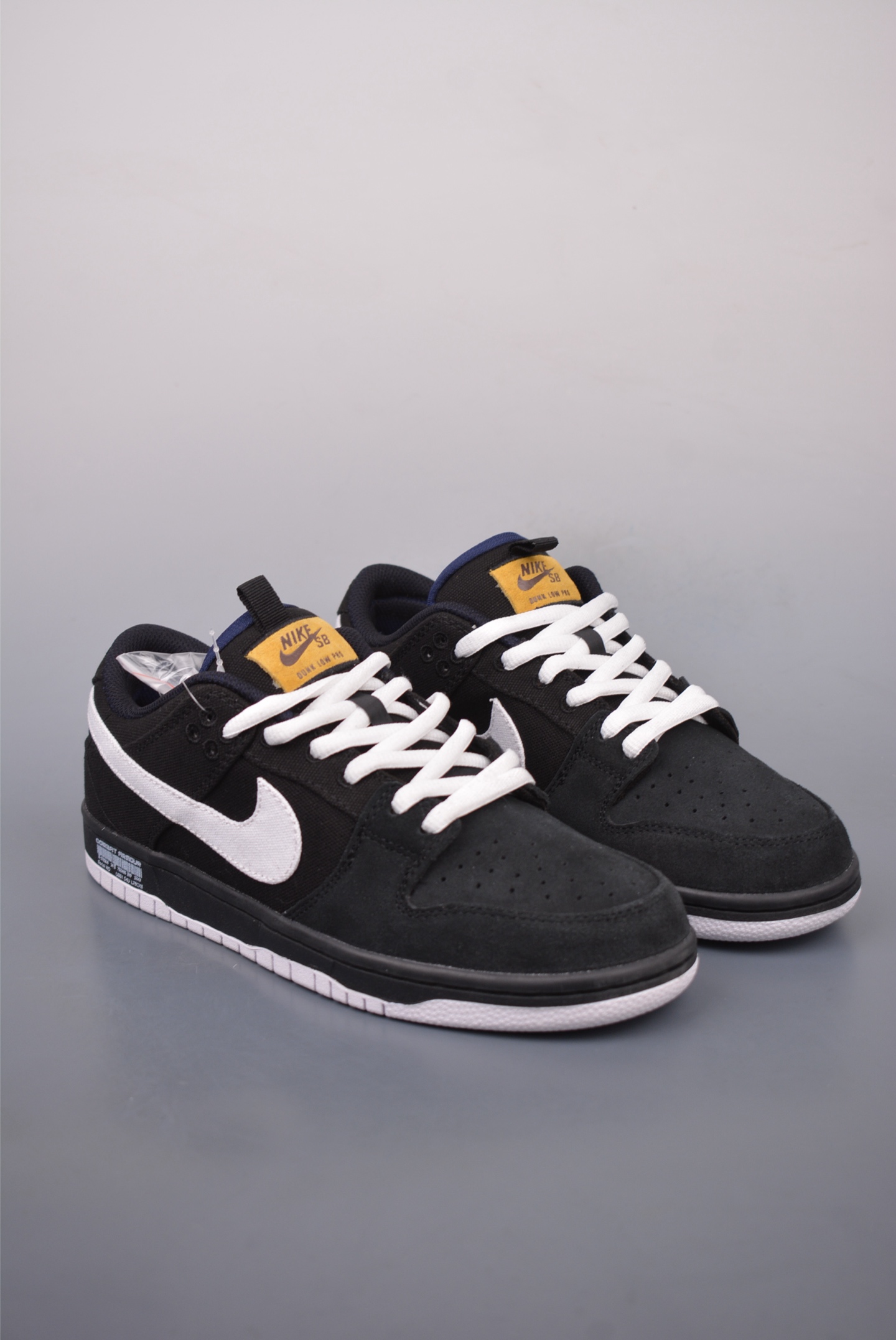 Nike SB Dunk Low Retro Sneakers Black and White DX6775-400