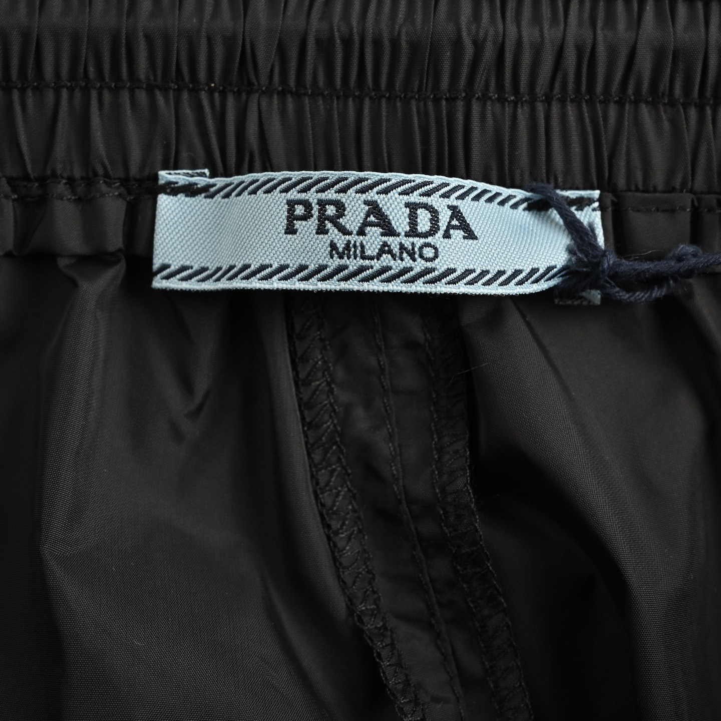 Prada 25ss printed logo nylon shorts