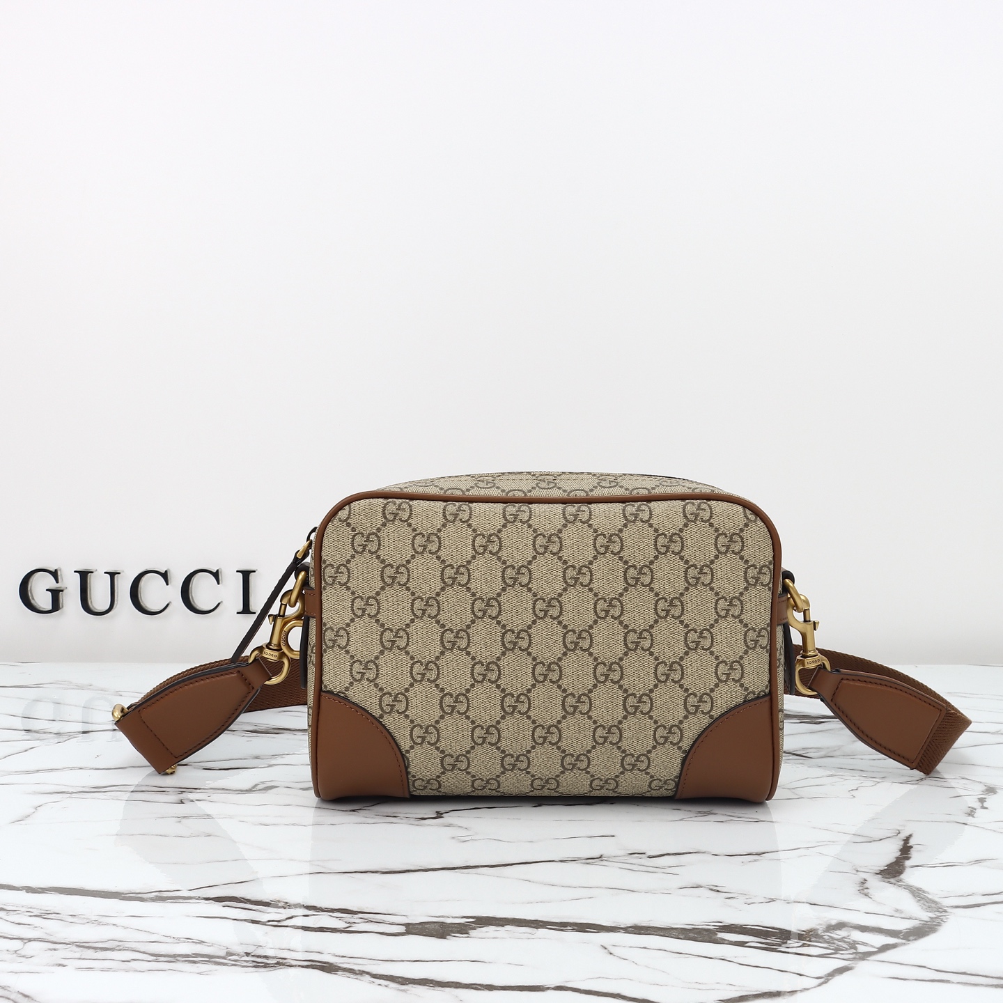 Gucci GG Emblem small crossbody bag 821155