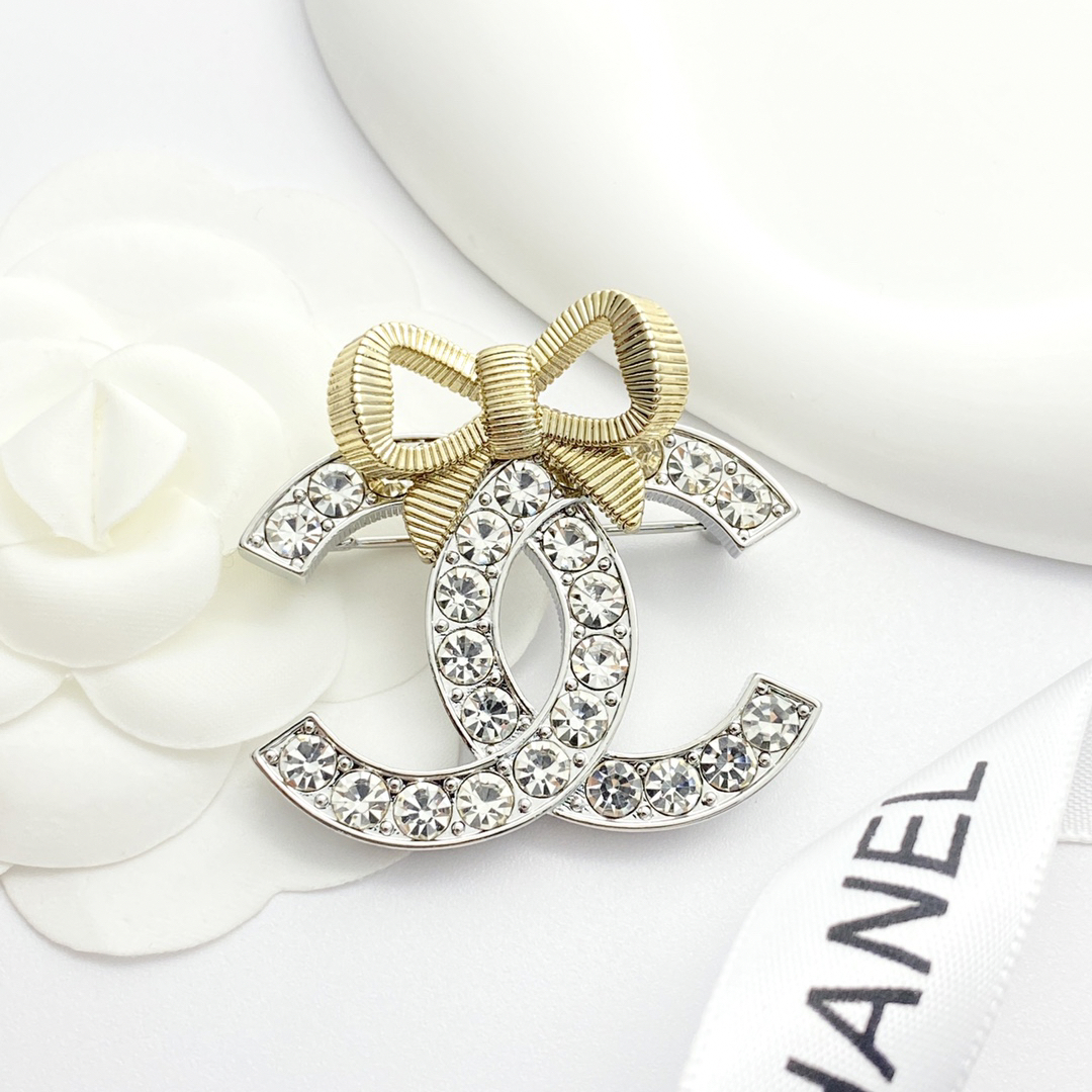 CHAN 24 gold and silver three-dimensional bow brooch