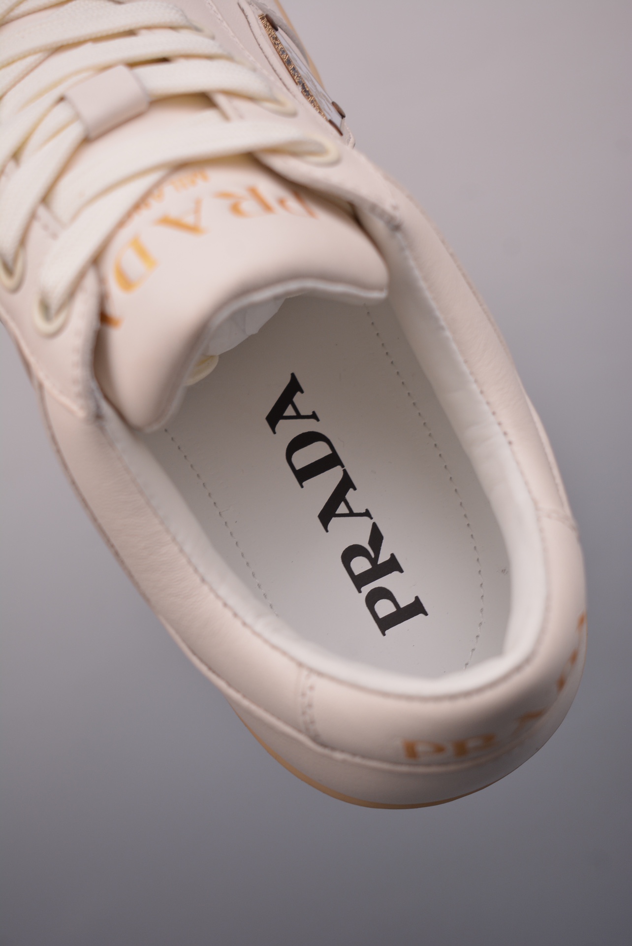 Prada Downtown Low Sneakers off-white