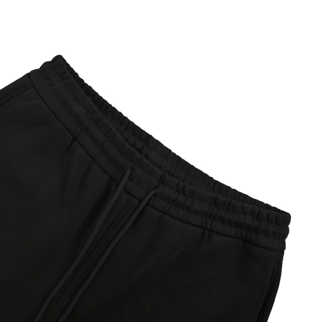 Loewe 24Fw heavy-cut embroidered logo patchwork trousers