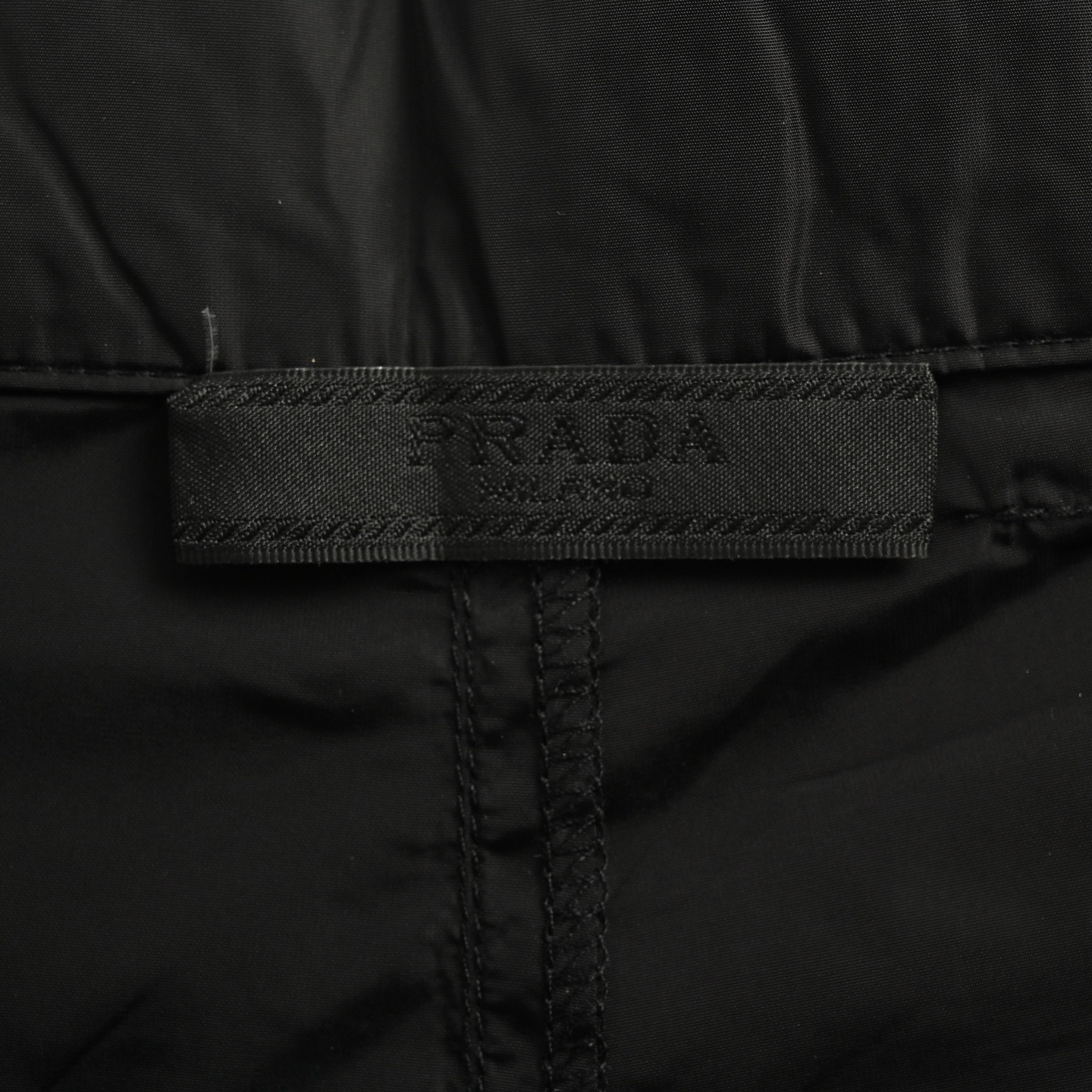 Prada 25Fw recycled nylon trousers with back flap pockets