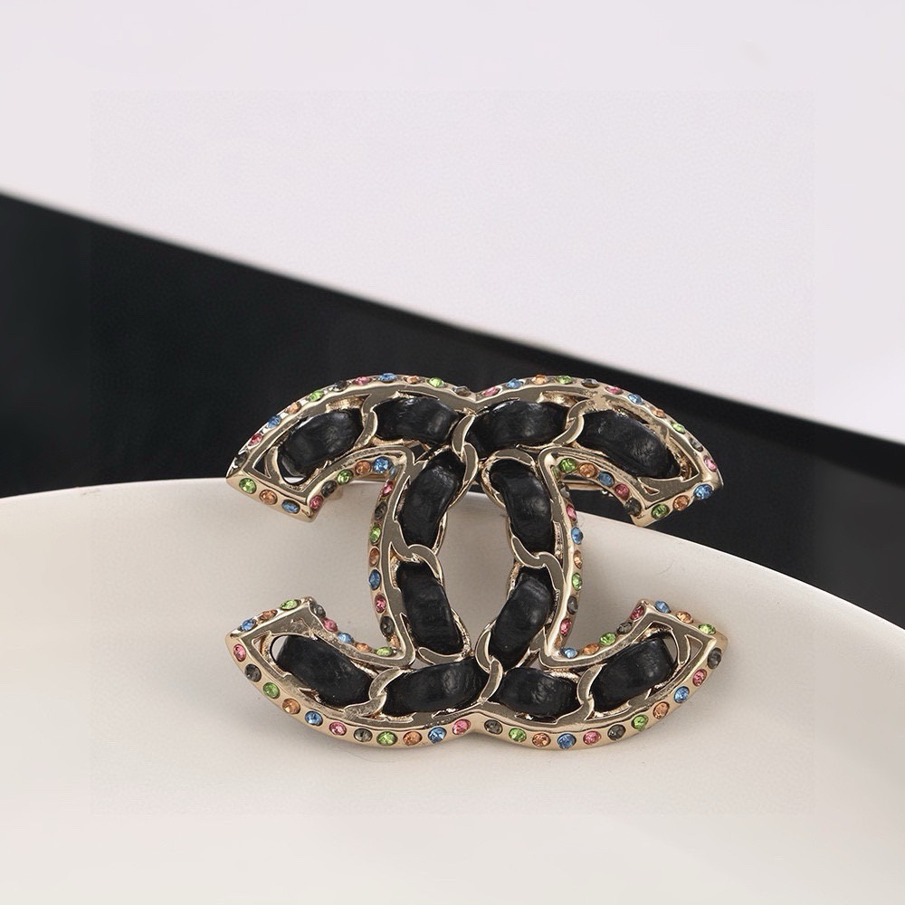 Chanel Black Leather Diamond Brooch