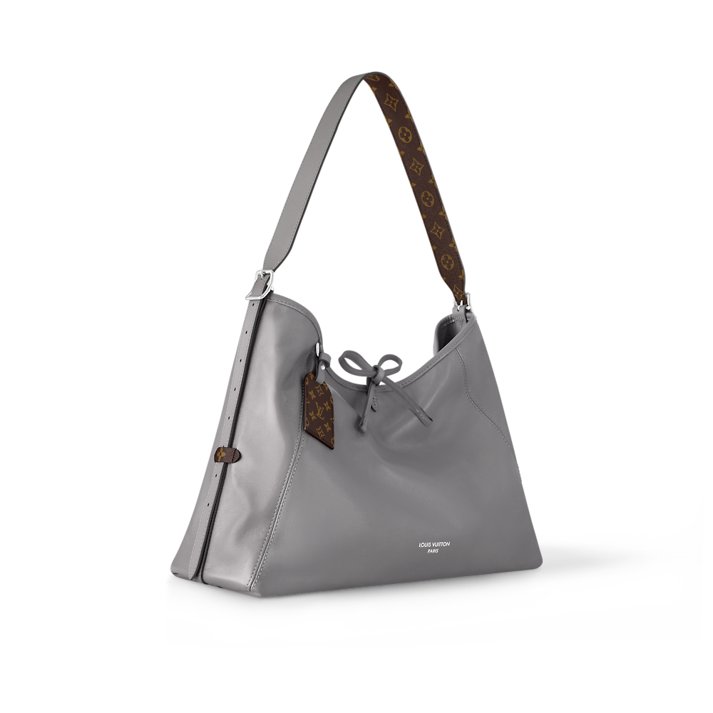Louis Vuitton CARRYALL VIBE Medium Handbag M12583